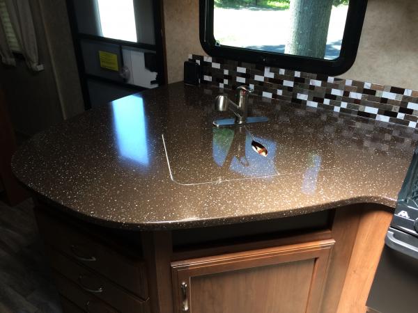 Solid surface counters polished up nicely after getting the trailer home.