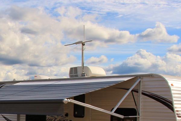 The Jefa Tech antenna raises and lowers with the travel trailers crank up antenna