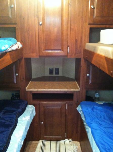 The kids bunk beds that are in the front of the V-Lite with ample storage in the v-nose of the trailer for clothes, books, etc...