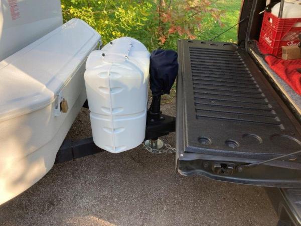 the tailgate open with the trailer hooked up, its often used to cook or prepare a meal, as work bench to do a repair. We have a small tarp that can be