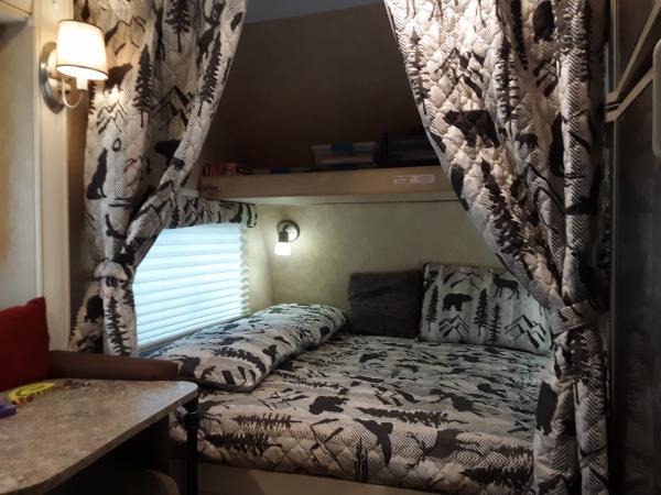 This is my most recent upgrade. I wanted to give the 'bedroom'  in my 185fbs a distinctive and more cozy feel and I wanted an outdoorsy theme.  So wit