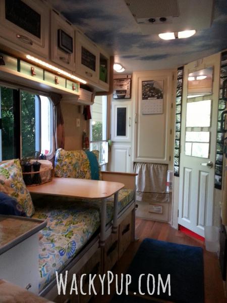 This is the view from the bed to the front door. Behind that little curtain is a real washing machine. On the right is a real dishwasher. Since we are