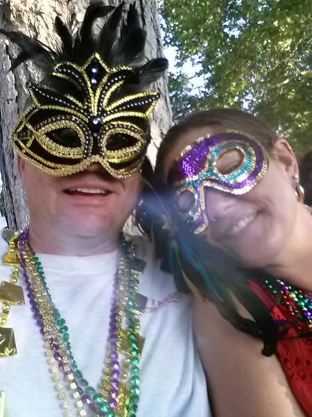 Todd and Theresa at Mardi Gras party :-) Rare view of Todd wearing feathers. Hahaha!