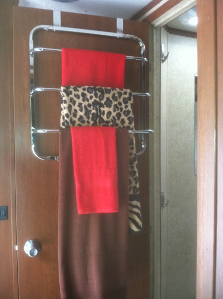 Towel rack over bathroom door