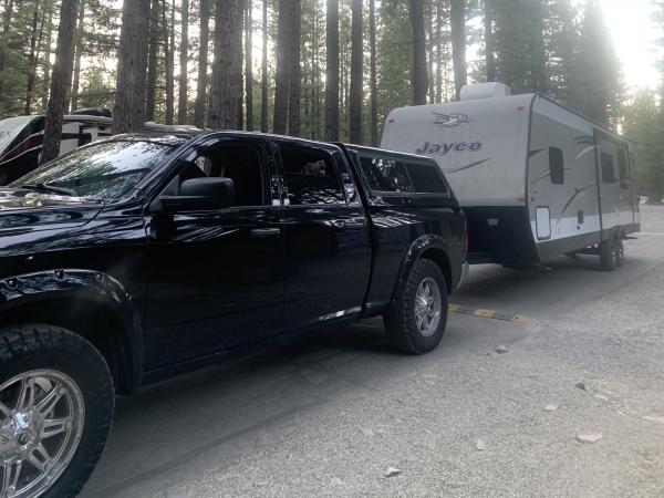 Trailer behind my truck for the first time. Just picking it up after purchasing it from the previous owner.