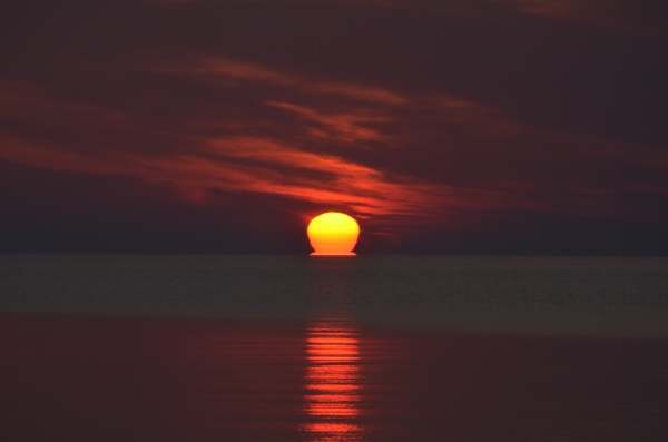 Various stages of sunrise on Lake Huron on Friday, July 10, 2015