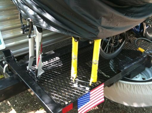 View of rear carrier with fork mounts for 3 bikes (2 shown)