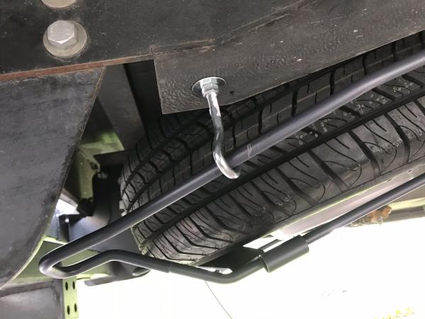 Website says the “clothesline hooks” aren’t designed for a “hanging load” but the bulk of the weight is on the hook plates since the tire is mounted a