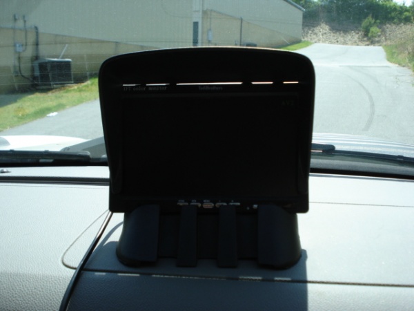 Wireless 7 inch color monitor receives from wireless camera whether attached to back of truck or camper.