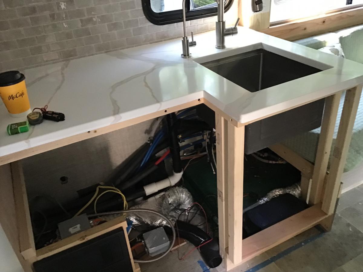 Work continues under the cabinet. Need to make the best use of the space. Note the diesel heater installed below the sink in the kick place.