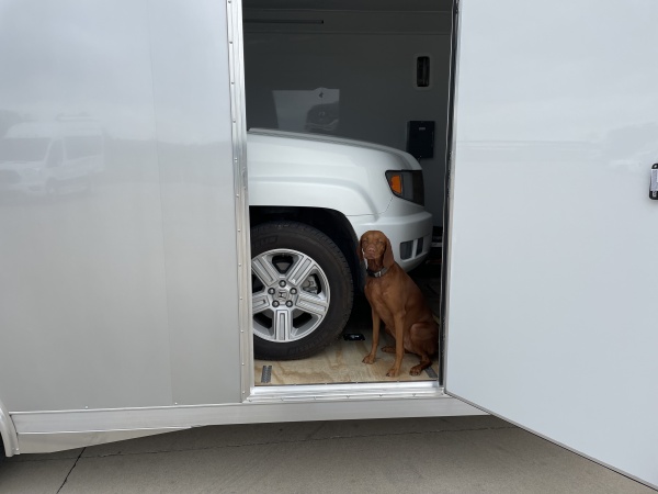 Yes, there is my Ridgeline in that trailer...soon to be Jeep and KTMS