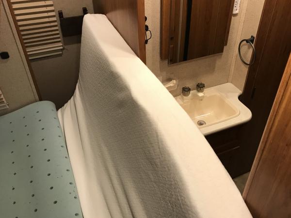 Zinus Memory Foam 6 Inch - Folds easily when the slide is brought in. Never really go into the back room but you can still lift the sides up if needed